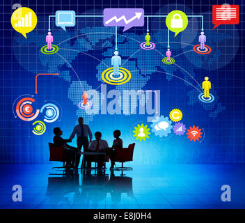 Group Of Business People Silhouettes Working Indoors And Global Networking Themed Background Stock Photo