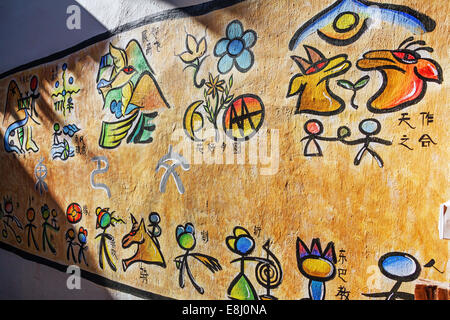 LIJIANG,CHINA - SEPTEMBER 16, 2014: Naxi Dongba paintings in Lijiang, China on September 16, 2014. Stock Photo