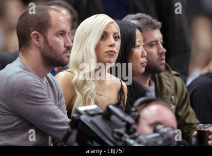 Berlin, Germany. 08th Oct, 2014. Lady Gaga attends the basketball game between Alba Berlin and the San Antonio Spurs as part of the 'NBA Global Games' in Berlin, Germany, 08 October 2014. Photo: LUKAS SCHULZE/dpa/Alamy Live News Stock Photo