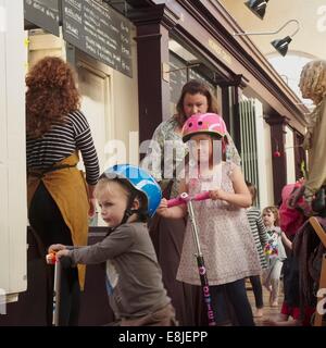 Queuing to order a freshly made pizza at the newly refurbished Victorian Altrincham Market Hall in Cheshire Stock Photo