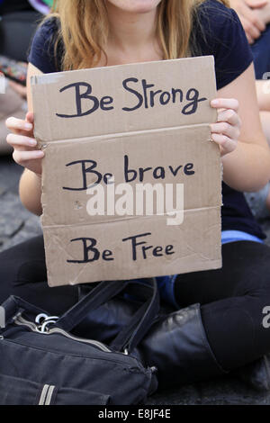 Slogan "Be strong, be brave, be free". Stock Photo