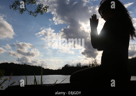 Woman Praying. Stock Photo