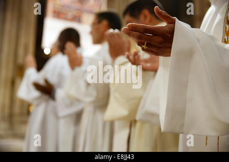 Our father prayer. Chrism mass. Notre Dame de Paris Cathedral. Stock Photo