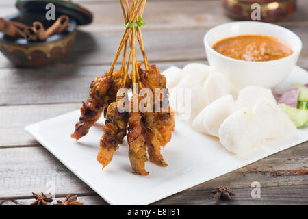 delicious malaysian satay with curry sauce Stock Photo