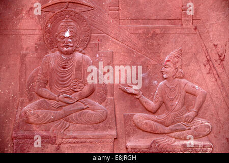 Bhagavad Gita engraved on a Hindu temple : dialogue between Krishna and Arjuna Stock Photo