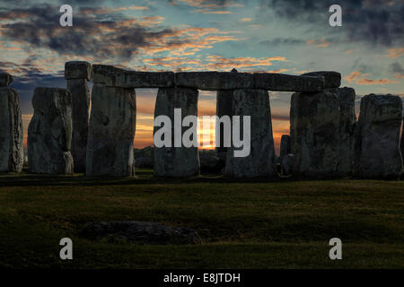 Close up of Stonehenge with winter solstice sunset (simulated), no people Stock Photo