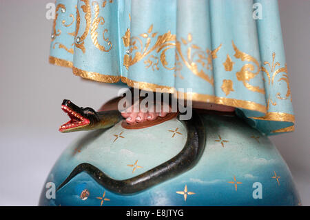 Statue of Jesus as a child overpowering a snake symbolising evil Stock ...