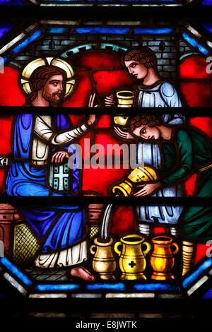 St Barth's church. Stained glass window. Marriage at Cana. Stock Photo