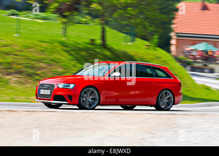 Audi RS4 2012 red driving Stock Photo