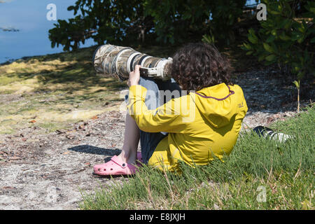 Female nature photographer Stock Photo