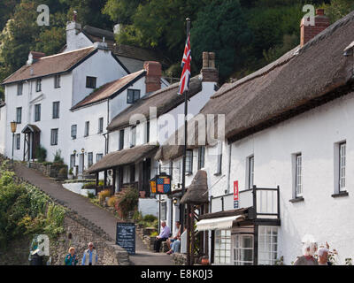 Thatched hostelry in a street in the town of Lynmouth in Devon which lies at the foot of a gorge at the top of which is Lynton Stock Photo