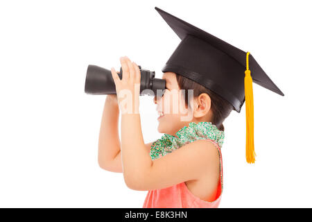 happy asian Little girl looking through binoculars. isolated on white background Stock Photo