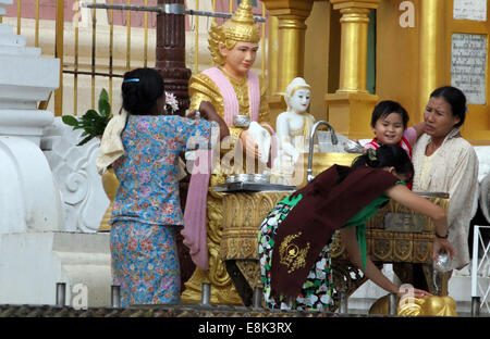 A family at Shwedagon Pagoda, Rangoon, Burma (Myanmar) Stock Photo