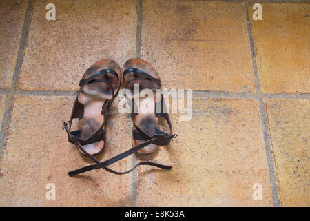 Pair of old sandals. Stock Photo