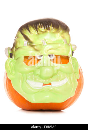 Pumpkin wearing a halloween mask cutout Stock Photo