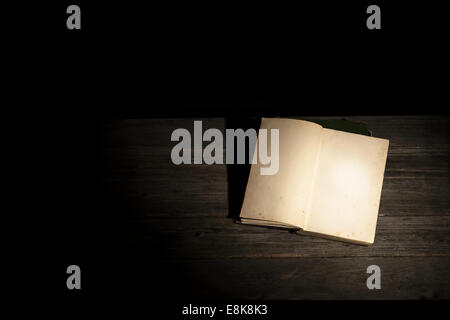 Opened old yellowed book Stock Photo