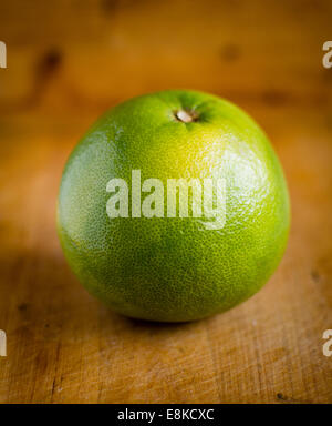 White grapefruit on wooden background Stock Photo