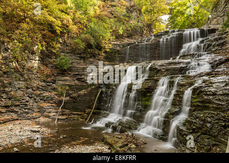 Mulit-tiered waterfall in Cascadilla Gorge on the Cornell Campus in Autumn in Ithaca, New York Stock Photo