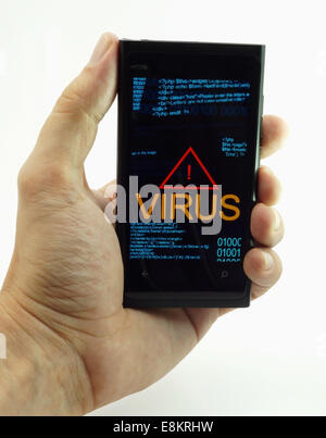 Security concept: man's hand touching smart phone with text Virus Stock Photo