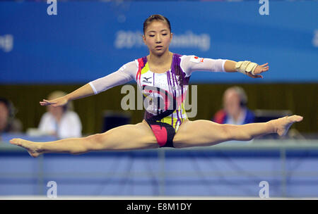 Japanese gymnast performs on women's vault during competition at 1984