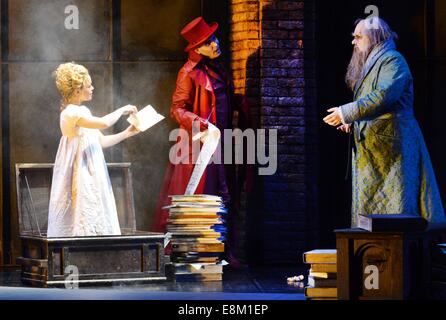 Leipzig, Germany. 9th Oct, 2014. Mirko Roschkowski as Faust, Tuomas Pursio as Mephisto and Olena Tokar as Margarethe (R-L) perform during the dress rehearsel of 'Faust' by Charles Gounods at Leipzig Opera in Leipzig, Germany, 09 October 2014. The opera will premier on 11 October as part of the celebrations of the 1000th anniversary of the city of Leipzig in 2015. Credit:  dpa picture alliance/Alamy Live News Stock Photo