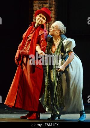 Leipzig, Germany. 9th Oct, 2014. Tuomas Pursio as Mephisto and Karin Lovelius as Marthe (L-R) perform during the dress rehearsel of 'Faust' by Charles Gounods at Leipzig Opera in Leipzig, Germany, 09 October 2014. The opera will premier on 11 October as part of the celebrations of the 1000th anniversary of the city of Leipzig in 2015. Credit:  dpa picture alliance/Alamy Live News Stock Photo