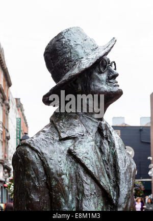 Bronze statue of James Joyce at the writer's grave at the graveyard ...