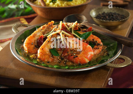 Jhinga kali mirch. Prawns spiced with black peppercorns. India Food Stock Photo