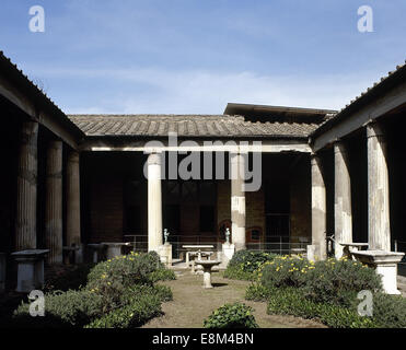 Italy. Pompeii. House of the Vettii. Luxurious residence (domus). Reconstruction of the peristyle. Stock Photo