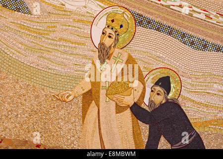 Bratislava - mosaic  in St. Sebastian cathedral  by jesuit Marko Ivan Rupnik (2011) with the saints Cyril and Methodius. Stock Photo