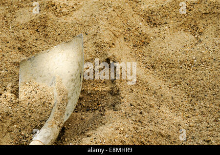 A shovel in a sand close up Stock Photo