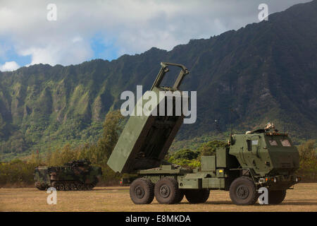 July 12, 2014 - A U.S. Marine Corps M142 High Mobility Artillery Rocket System conducts dry-fire exercises in support of infantr Stock Photo