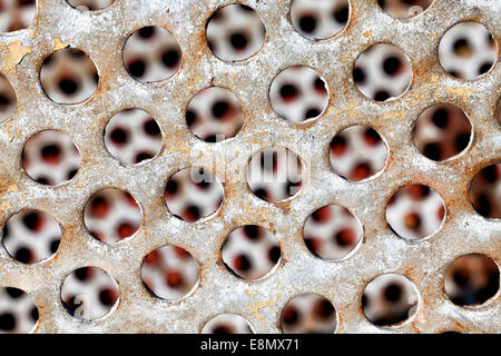 old perforated metal plate Stock Photo