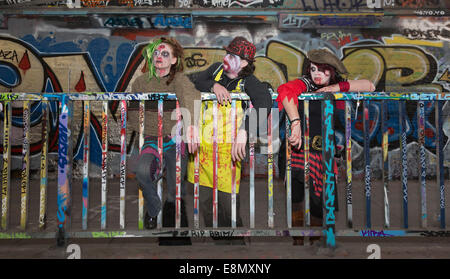 London, UK. 11 October 2014. Hundreds of scary Zombies gathered on World Zombie Day 2014 in the graffiti-covered tunnel underneath Waterloo Station, before setting off on a trek through Central London. Credit:  Nick Savage/Alamy Live News Stock Photo