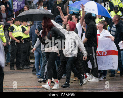 Members of the English Defence League Taunt Anti fascist protestors as both sides face each other during a protest about the opening of a Muslim school within Portsmouth, England Stock Photo