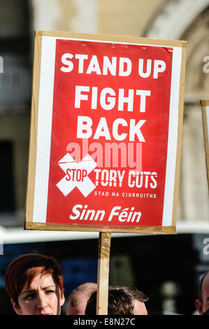 Belfast, Northern Ireland. 11/10/2014 - Banners calling for the end of Tory austerity cuts at a protest. Stock Photo