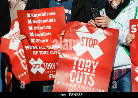 Belfast, Northern Ireland. 11/10/2014 - Banners calling for the end of Tory austerity cuts at a protest. Stock Photo