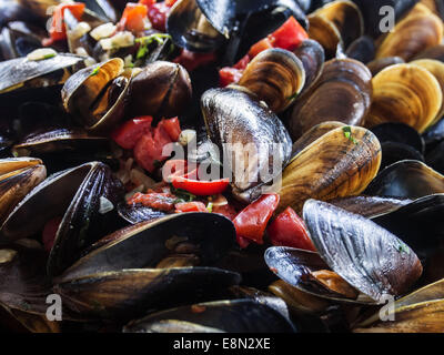 Mussels. 11th Oct, 2014. -- Street food presented traditional Ukrainian, English, Indian, Moroccan cuisine. In the menu, there is a barbecue, roasted on the fire vegetables, Thai noodles, seafood, fish, desserts, hot dogs and more. There are about 15 participants with an updated autumn menu. © Igor Golovniov/ZUMA Wire/Alamy Live News Stock Photo