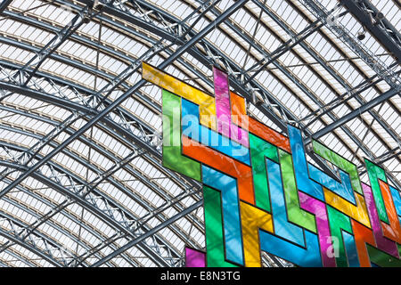 Chromolocomotion by David Batchelor hanging at St. Pancras Internation Station in London, April 2014 Stock Photo