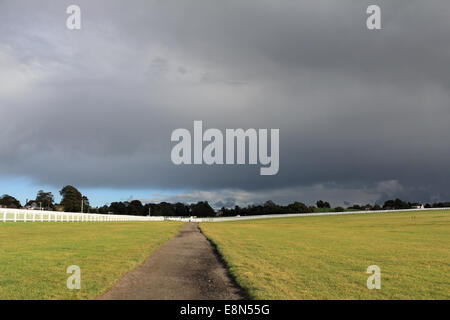 Epsom Downs, Surrey, UK. 11th October 2014. Dramatic rain clouds pass over Epsom Downs Race Course. Credit:  Julia Gavin UK/Alamy Live News Stock Photo