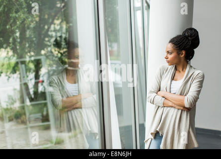 Pretty young woman in the office Stock Photo