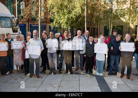 Belfast, Northern Ireland. 11th Oct, 2014. Some of the people who may be worst off from the Welfare reforms that are due to be imposed by the Coalition Government Credit:  Bonzo/Alamy Live News Stock Photo