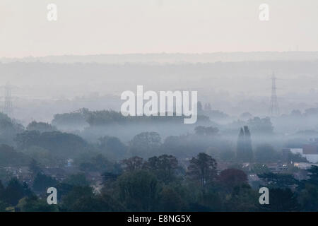Wimbledon, London, UK. 12th October, 2014. UK weather. A band of early mist covers the landscape in south west © amer ghazzal/Alamy Live News Stock Photo