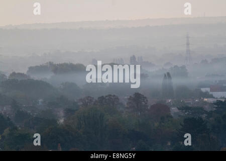 Wimbledon, London, UK. 12th October, 2014. UK weather. A band of early mist covers the landscape in south west © amer ghazzal/Alamy Live News Stock Photo