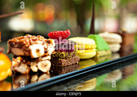 Gorgeous view of different cakes and biscuits, served in outdoors Stock Photo