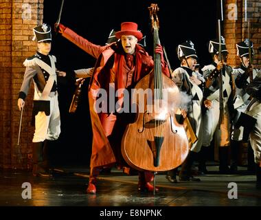Leipzig, Germany. 09th Oct, 2014. A photo of the dress rehearsal shows Tuomas Pursio as Mephisto acting in Charles Gounod's 'Faust' in the Opera house in Leipzig, Germany, 09 October 2014. The Opera, which premieres on 11 October 2014, is the musical kick-off within the framework of the 1000th anniversary of the city Leipzig in 2015. Photo: Waltraud Grubitzsch/ZB/dpa/Alamy Live News Stock Photo