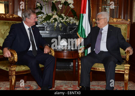 Cairo, Egypt. 12th Oct, 2014. Palestinian president Mahmud Abbas (R) meets with Minister of Foreign Affairs of Luxembourg Jean Asselborn on the sidelines of the opening session of the Gaza Donor Conference in Cairo on October 12, 2014, aimed at helping the Gaza Strip pummelled by the 50-day war between Israel and Hamas militants earlier this year. Credit:  ZUMA Press, Inc./Alamy Live News Stock Photo