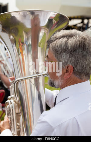 Members of Florence Brass band plays on at  Leek Staffordshire County Show on a warm summers day,Temperature reached 27° Celsius Stock Photo