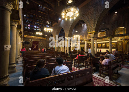 Cairo, Egypt. 12th Oct, 2014. People are seen in the hanging Coptic church in Cairo, Egypt, Oct. 12, 2014. The centuries-old church was reopened on Oct. 11 after 16 years of renovation. Credit:  Pan Chaoyue/Xinhua/Alamy Live News Stock Photo