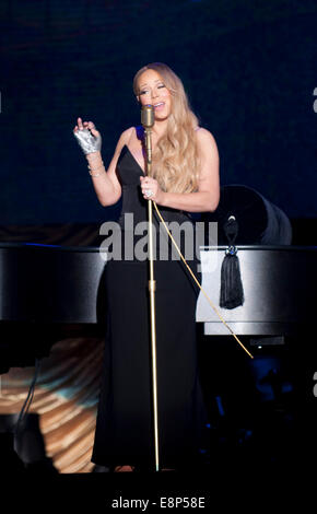 Chengdu, China's Sichuan Province. 12th Oct, 2014. American singer Mariah Carey sings at her solo concert in Chengdu, capital of southwest China's Sichuan Province, Oct. 12, 2014. Credit:  Jiang Hongjing/Xinhua/Alamy Live News Stock Photo